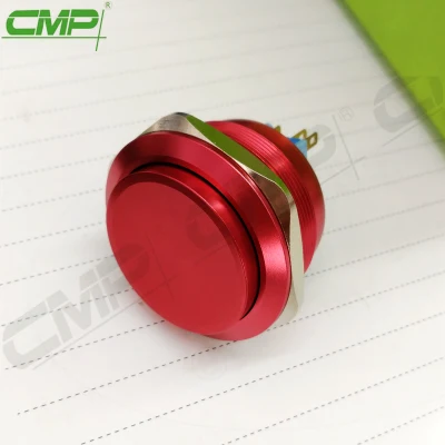 Красный металлический кнопочный переключатель диаметром 40 мм с большой кнопкой.